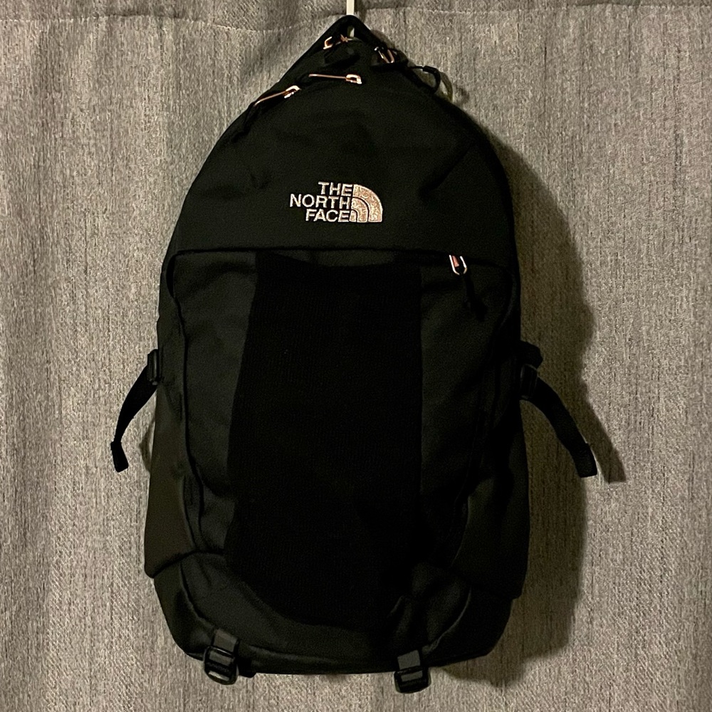 North face women’s Recon Lux Backpack TNF BLK HEATHER w/ burnt coral metallic